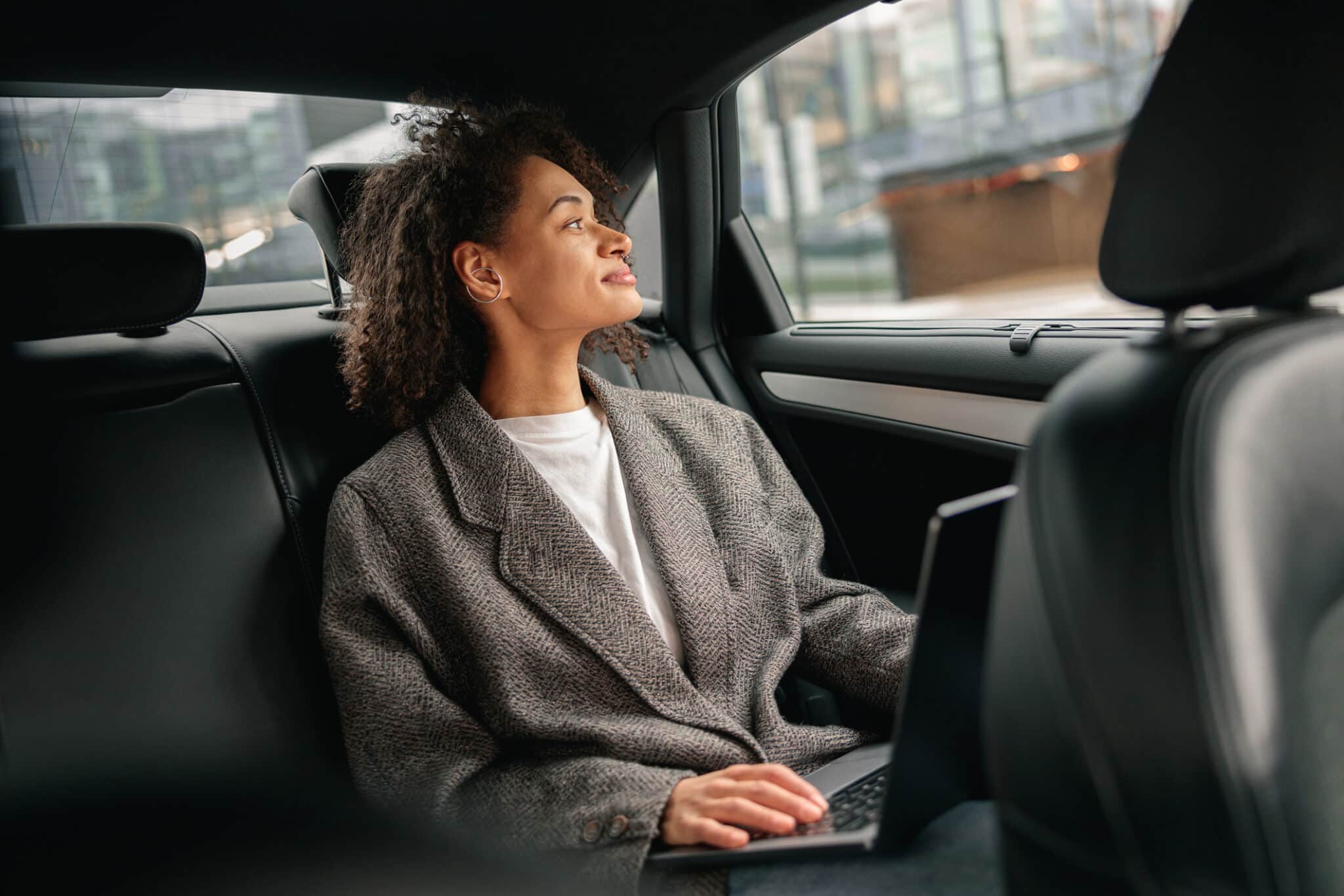 Passenger relaxing in a premium vehicle